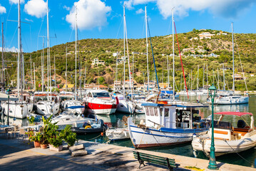 Sailing and fishing boats anchoring in Sivota port, Lefkada island, Greece