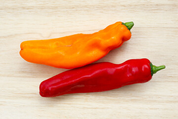 Palermo sweet chilli pepper on wooden background.