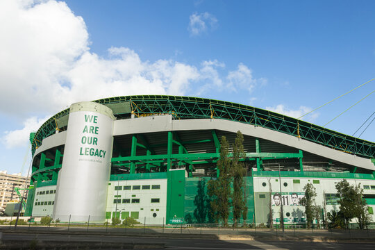 Lisboa, Portugal 2025-11-12 Exterior view of the Sporting Clube de Portugal stadium in Lisbon, distinctive green structure and a large cylindrical tower displaying the message &ldquo;We Are Our Legacy.&rdquo;