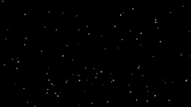 Isolated falling snow on black background. Stock video snowfall. 