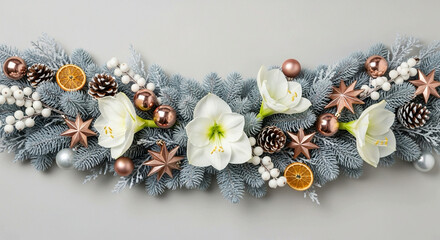 An elegant winter garland features frosted fir branches, white Amaryllis flowers, rose gold ornaments, pine cones, and dried orange slices on a light gray background.