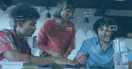 Leaning woman in red sweater and two men reviewing documents at meeting table, with HUD overlay