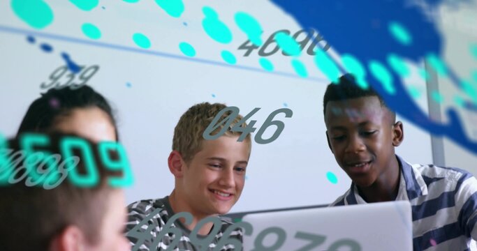 Working group of four leaning over laptop at classroom table, with AR overlays and striped shirts