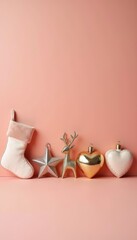 Christmas decorations with stocking, star, reindeer, and heart-shaped ornaments on pastel pink background