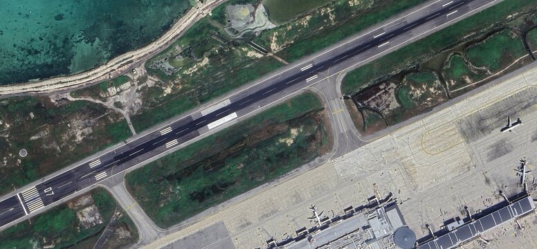 Satellite View of Sangster International Airport Runway Adjacent to the Turquoise Caribbean Sea
