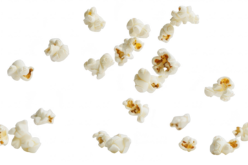 A dynamic scene capturing popcorn kernels in mid-air. their light and fluffy texture against a clean white background. perfect for food-related content or snack promotions