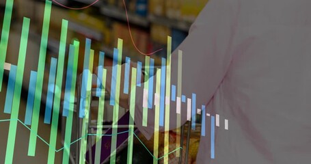 Senior female shopper pushing cart down grocery aisle, initiating vertical bars and line graphs - Powered by Adobe