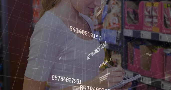 Woman writing with pen on pad in retail aisle, generating numeric grid sweeping across foreground