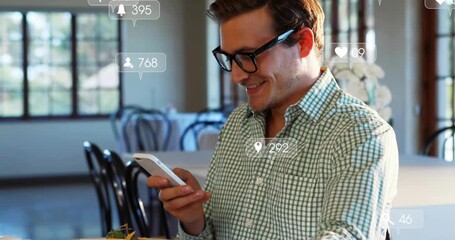 Man holding phone at table, tapping while notifications appearing near face, tracking social media - Powered by Adobe