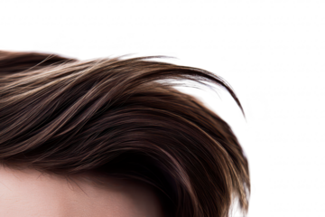 Close-up view of a persons hair sleek. shiny strands with a slight wave. set against a minimalist white background. perfect for beauty and fashion contexts