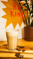 cup of coffee and cinnamon sticks