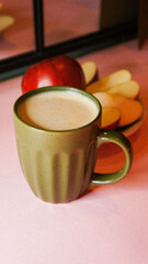 cup of coffee with apple slices