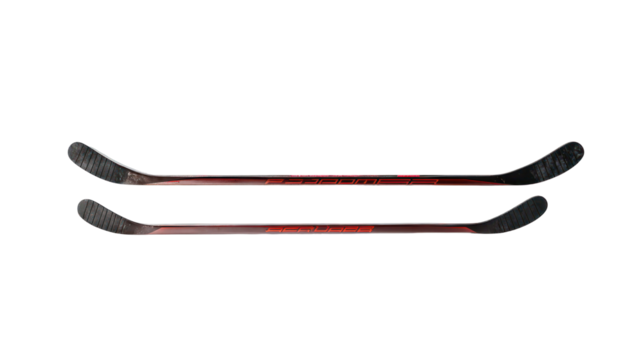 Two hockey sticks with red blades isolated on transparent background