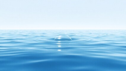 Calm ocean surface with gentle ripples and sunlight reflection