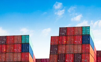 Cargo ship container goods export import international transport on blue sky background, warehouse industry business logistics transportation harbor port industrial shipping terminal cargo ship.