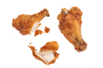 A close-up view of crispy fried chicken drumsticks. their golden-brown texture. with a piece broken off to reveal juicy meat inside. against a clean white background