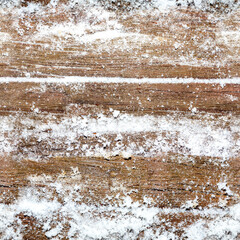 Seamless 4k photo texture of oak wood plank material surface covered in snow.