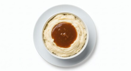 Overhead shot of creamy mashed potatoes with turkey gravy.
