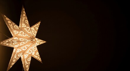 Illuminated Christmas Star Decoration on Dark Background.
