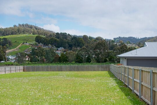 A vacant allotment of land ready for home building and housing development in an Australian suburb.