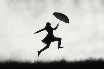 Silhouette of person in coat and hat leaping above grassy horizon while holding an umbrella against a cloudy sky, joyful and whimsical