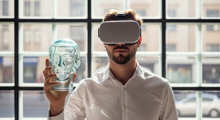 Man wearing virtual reality headset exploring a 3D model of a human head