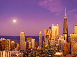 Aerial Sunset View of John Hancock Center with Chicago Skyline and Lake Michigan Reflections” November 12, 2025