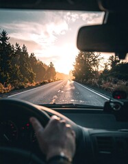 Fototapeta premium View from the driver's seat on a road with trees