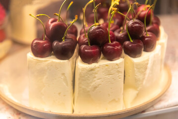 cake with with berries, strawberries and cherries. cake on a background. copy space
