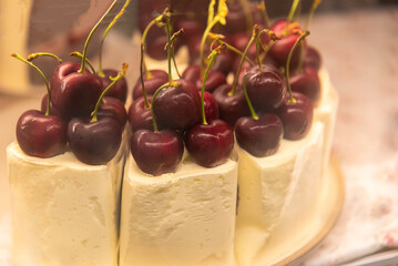 cake with with berries, strawberries and cherries. cake on a background. copy space