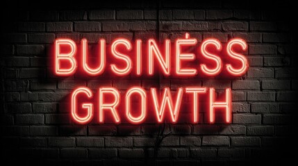 Business Growth" in red neon on grey brick--strong, driven theme.