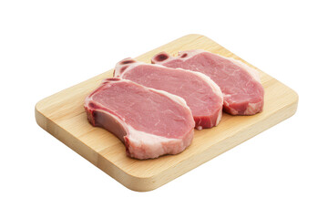 A clean and fresh display of three raw pork chops arranged neatly on a wooden cutting board. their pinkish color and marbled texture. ideal for culinary use or recipe illustrations