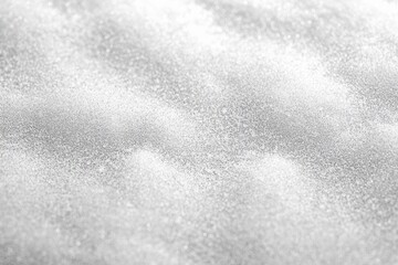 Obraz premium close-up of sparkling silver glitter forming soft dunes and shimmering textured surface, calm and serene mood