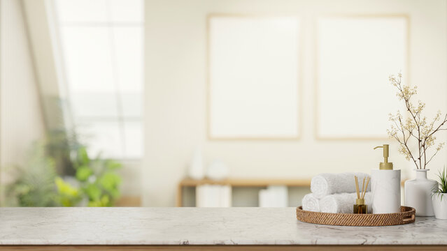 White body wash lotion pump bottle and towel and diffuser on marble stone counter in bright spa room