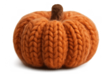 Knitted orange pumpkin decorating for autumn harvest festival, cozy halloween or thanksgiving holiday celebration on transparent background