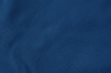 Dark blue leather texture background with seamless pattern and high resolution.
