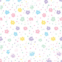 Cute seamless pattern with pastel flowers and confetti sprinkles. Whimsical ditsy floral vector background for kids, baby shower, and fabric design.