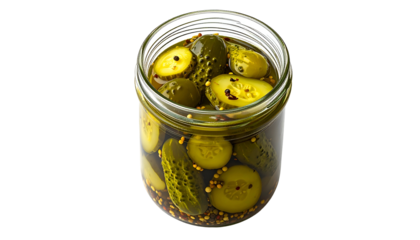 A clear jar filled with a variety of pickles in a brine, photographed against black