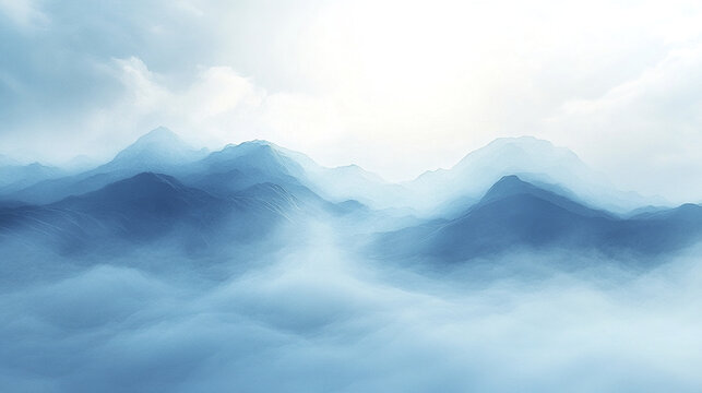 Soft blue mountain range with mist and clouds under bright sky, creating calm and peaceful atmosphere in natural landscape scene