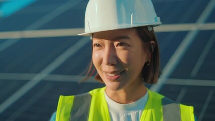 Solar energy expert discusses project at renewable site in sunny location - Powered by Adobe