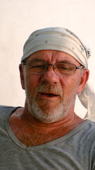 Portrait of an elderly man. Selective focus.