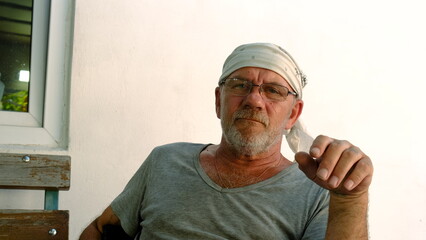 Portrait of an elderly man. Selective focus.