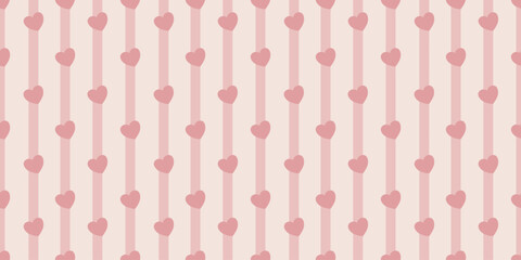 Pink seamless heart pattern on a soft background for cute romantic wallpaper and fabric designs