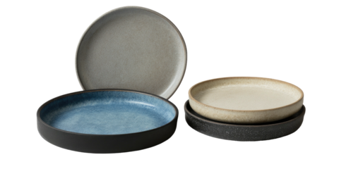 Set of three ceramic bowls with varied colors and textures