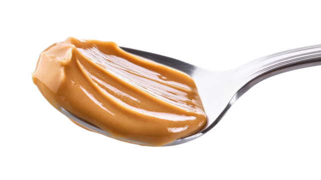 Peanut butter on metal spoon isolated on a transparent background