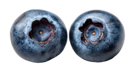 Two ripe, blue, round berries with a crown