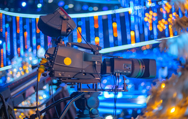 camera on the set of a Christmas TV show