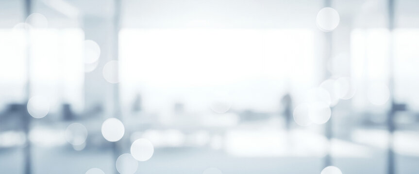 Bright abstract background with soft blue bokeh light circles, creating a calm luminous ambience with gentle glowing highlights and smooth visual gradients across the scene.