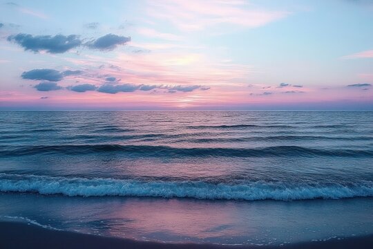 tranquil pastel sunset over calm sea with gentle rippling waves, soft clouds and reflective wet shoreline - Powered by Adobe