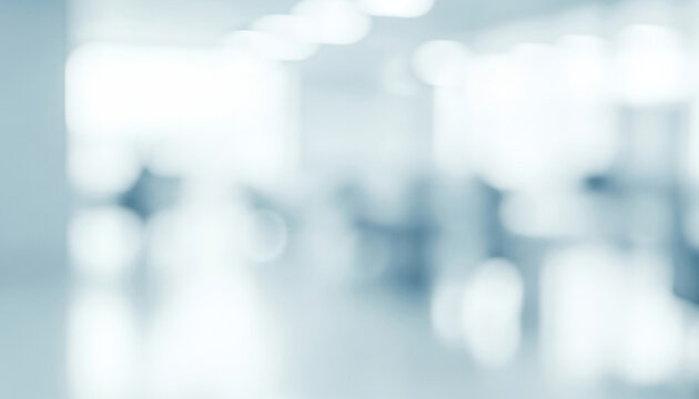 Bright abstract background with soft blue and white light blurs, creating a clean and calming atmosphere with glowing tones that resemble a modern digital surface illuminated